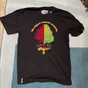 Embroidered tree shirt.